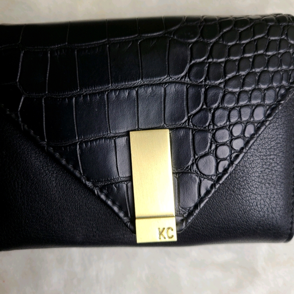 Kenneth Cole Reaction black wallet gold tone hardware